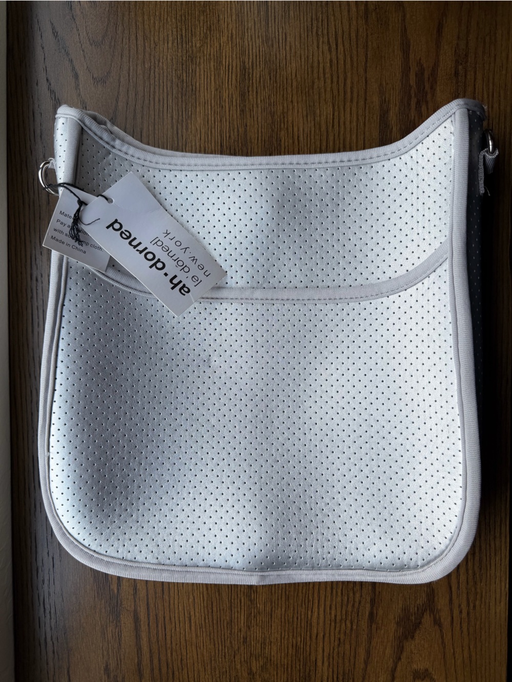 Ahdorned Silver Perforated Crossbody Bag